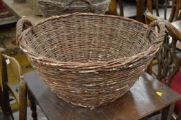 A wicker twin handled basket.