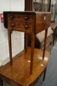 A 19th century mahogany two drawer drop-flap worktable.