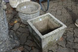 Two composite garden planters.