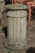A composite garden pedestal.