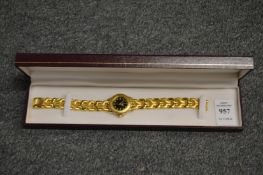A ladies gilt metal wristwatch, boxed.