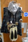 A Scottish kilt together with sporrans etc.