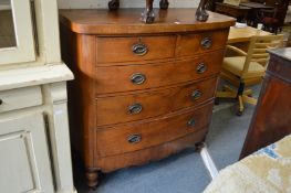 A Victorian bow front chest of drawers.