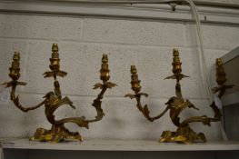 A pair ormolu three branch candelabra.