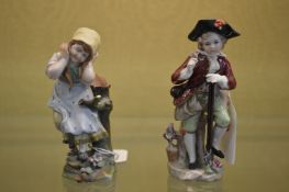 Two small continental porcelain figures.