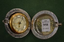 A folding travelling watch.