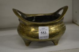 A Chinese bronze censor.