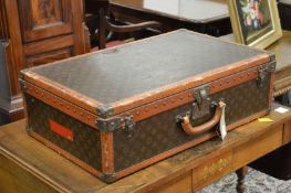 A Louis Vuitton suitcase.