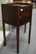 A mahogany pot cupboard.
