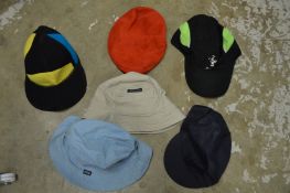 A collection of six hats.