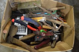 A box of gardening and other tools.