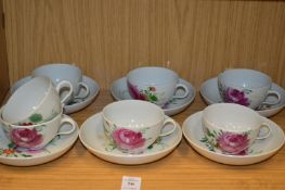 A set of six continental floral decorated cups and saucers.