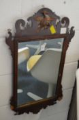 A mahogany fretwork framed wall mirror (af).
