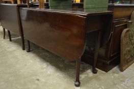 A 19th century mahogany drop leaf gateleg dining table.