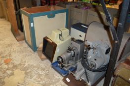 A quantity of projectors and related equipment together with two travelling typewriters.