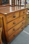 A mahogany chest of drawers.