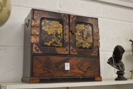 A Japanese tabletop cabinet.