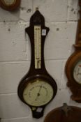 A barometer/thermometer.