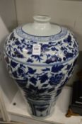 A large Chinese blue and white vase.
