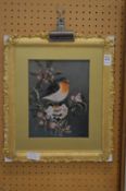 A robin standing on a floral branch, oil on board.