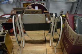 A dressing table mirror.