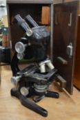 Cased microscope.
