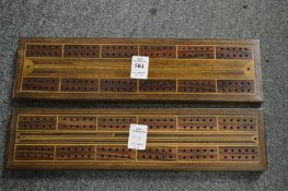 Two inlaid cribbage boards.