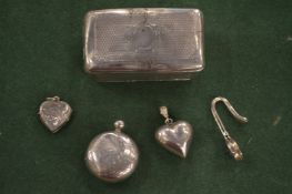 A small white metal box, sovereign holder etc.
