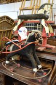 Two rocking horses and a similar item.