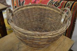 A wicker twin handled basket.