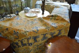 A large beige ground woollen carpet, reduced in length 400cm x 210cm.