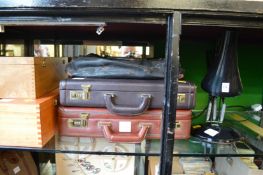 An angle poise lamp and other items.