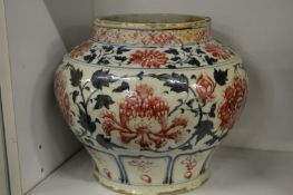 A large Chinese bulbous shaped jar.