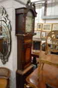 A 19th century longcase clock with painted arch dial.