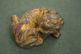 A Chinese gilded metal of a recumbent lion.