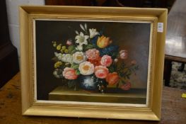 A still life of flowers in a vase on a ledge, oil on board.