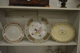 Three decorative plates.