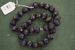 A decorative glass bead necklace.