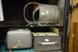 An old watering can, projectors, projector screens etc.