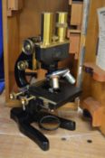 Cased microscope.