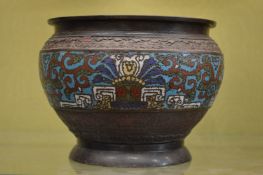 A cloisonne bowl.