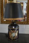 A pair of decorative toleware style table lamps.