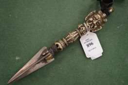 An Islamic metal spike.