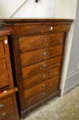 A French mahogany seven drawer chest.