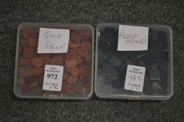 Two boxes of decorative stones.