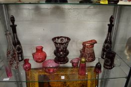 A quantity of cranberry and ruby coloured glassware.
