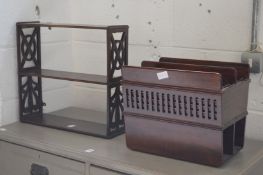 A mahogany wall shelves and magazine rack.