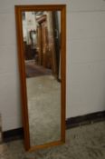 A pine framed dressing mirror.