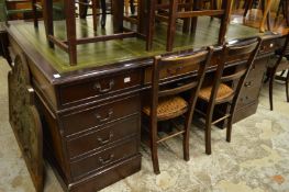 A reproduction mahogany partners desk.