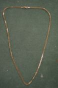 A 9 carat gold curb link chain.